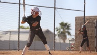 Alissa Perkins stands in the batter’s box awaiting the pitch. She’s one of the best hitters on the Desert Oasis High softball team ...
