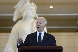 President Joe Biden speaks at the U.S. Holocaust Memorial Museum's Annual Days of Remembrance ceremony at the U.S. Capitol, Tuesday, May 7, 2024 in Washington. Statue of Freedom stands behind.

