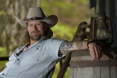 Brian Kelley poses for a portrait outside his cabin Wednesday, April 17, 2024, in Nashville, Tenn. 


