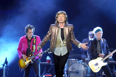 Mick Jagger, center, sings while flanked by Rolling Stones bandmates Ronnie Wood, left, and Keith Richards during the Stones’ “Hackney Diamonds Tour” stop at Allegiant Stadium Saturday, May 11, 2024,