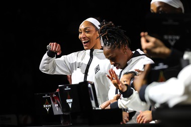 Las Vegas Aces center A’ja Wilson (22) shows off her championship ring during a ceremony before an WNBA basketball game against the Phoenix Mercury at Michelob Ultra Arena in Mandalay Bay Tuesday, May 14, 2024.