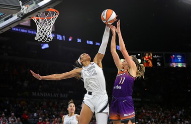Las Vegas Aces center A’ja Wilson (22) rejects a shot by Phoenix Mercury guard Rebecca Allen (11) during the first half of an WNBA basketball game at Michelob Ultra Arena in Mandalay Bay Tuesday, May 14, 2024.