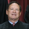 Associate Justice Samuel Alito joins other members of the Supreme Court as they pose for a new group portrait, Oct. 7, 2022, at the Supreme Court building in Washington. An upside-down American flag, a symbol associated with former President Donald Trump's false claims of election fraud, was displayed outside the home of Supreme Court Justice Samuel Alito in January 2021, The New York Times reported May 16.

