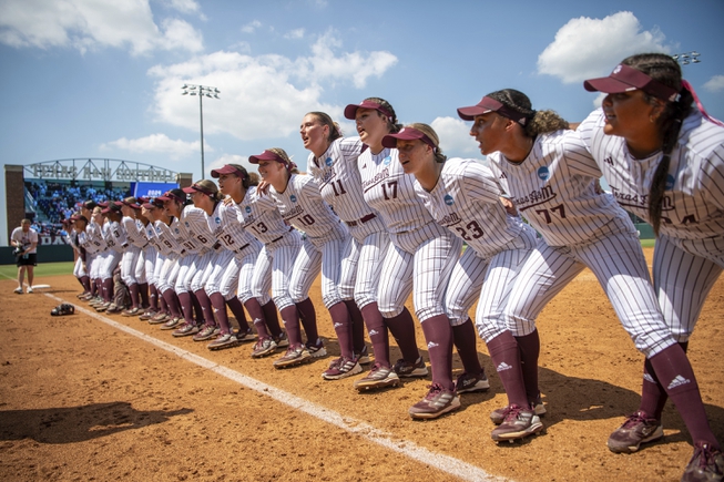 The Texas A&M softball team sings the Aggie War Hymn after the win during the NCAA Division I regional final softball game against Texas State on Sunday, May 19, 2024, in College Station, Texas. 



