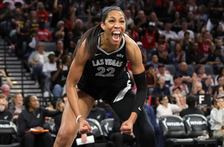 Las Vegas Aces center A'ja Wilson (22) celebrates after scoring a basket and drawing a foul during the second half of an WNBA basketball game against the Indiana Fever at Michelob Ultra Arena in Mandalay Bay Saturday, May 25, 2024.