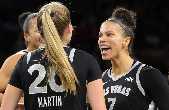 Las Vegas Aces forward Alysha Clark (7) congratulates guard Kate Martin (20) after a basket during the second half of an WNBA basketball game at Michelob Ultra Arena in Mandalay Bay Saturday, May 25, 2024.