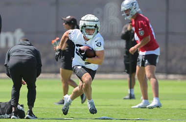 Las Vegas Raiders running back Dylan Laube (23) carries the ball during organized team activities (OTA) at the Raiders Headquarters/Intermountain Health Performance Center in Henderson Wednesday, May 29, 2024.