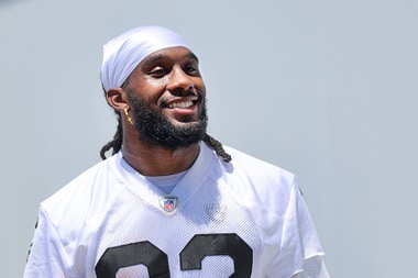 Las Vegas Raiders running back Alexander Mattison (22) waits to be interviewed during organized team activities (OTA) at the Raiders Headquarters/Intermountain Health Performance Center in Henderson Wednesday, May 29, 2024.