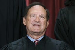 Associate Justice Samuel Alito joins other members of the Supreme Court as they pose for a new group portrait, Oct. 7, 2022, at the Supreme Court building in Washington.