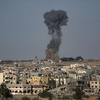 Smoke rises from an Israeli airstrike in Rafah, southern Gaza Strip, Friday, May 31, 2024. 