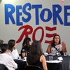 Laura Campbell, director of actions at Nevada NOW, shares a personal story during a roundtable on women’s reproductive rights with Congresswoman Alexandria Ocasio-Cortez, D-N.Y., at a Biden-Harris field office Thursday, June 20, 2024.