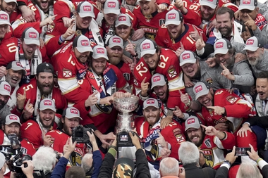 The Florida Panthers celebrate with the NHL hockey Stanley Cup after winning the Final against the Edmonton Oilers in Sunrise, Fla., Monday, June 24, 2024. 


