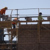Construction workers rebuild CW Woodbury Middle School Tuesday, June 25, 2024.