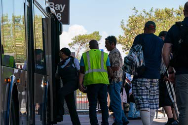 Customers wait for the bus in shaded areas of the South Strip Transit Terminal on Gillespie. The RTC is believed to be the first transit system in the United States to implement firearm-detecting technology of this nature utilizing artificial intelligence in Las Vegas, Nevada on Wednesday, June 26, 2024.
