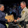 Photo: Clark County Fire Inspector Martin Castillas takes