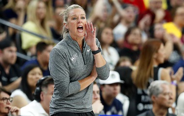 Indiana Fever head coach Christie Sides calls out to players during the first half of an WNBA basketball game between the Las Vegas Aces and the Indiana Fever at T-Mobile Arena Tuesday, July 2, 2024.