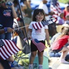 Photo: A child watches the Summerlin Council Patriotic Pa