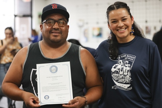 Street vendor Bertin Gonzales poses for a photo with Make the Road Nevada Member Service Director Celinda Dominguez Tuesday, July 16, 2024. Dominguez supported Gonzales through the process of obtaining a business license.