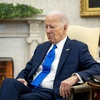 President Joe Biden sits in the Oval Office of the White House, Feb. 9, 2024, in Washington. Biden says he's "determined to get as much done as I possibly can" in his final six months in the White House but will face obstacles in his bid to burnish his legacy. 

