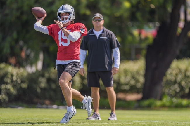 Las Vegas Raiders quarterback Gardner Minshew (15) practices during NFL football training camp at Jack R. Hammett Sports Complex in Costa Mesa, Calif., Wednesday, July 24, 2024.