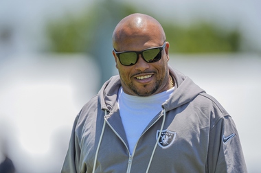 Antonio Pierce, head coach for the Las Vegas Raiders of the National Football League (NFL) smiles as he arrives at the Jack R. Hammett Sports Complex in Costa Mesa, Calif., Tuesday, July 23, 2024.