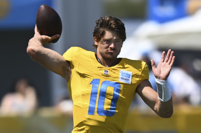 Los Angeles Chargers quarterback Justin Herbert warms up during NFL football training camp Friday, July 26, 2024, in El Segundo, Calif. 
