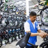 A worker organizes bicycles at a Walmart Superstore in Secaucus, New Jersey, July 11, 2024.