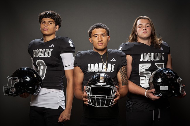 Members of the Desert Pines High School football team are pictured during the Las Vegas Sun's high school football media day at the Red Rock Resort on July 23, 2024. They include, from left, Steve Manuma, Lone Solomon and Gabriel Gough.