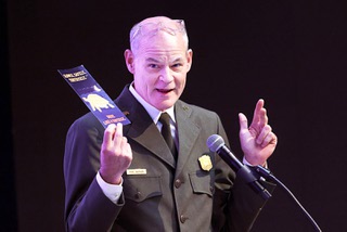 Mike Gauthier, right, superintendent of the Lake Mead National Recreation Area, holds a “drive Like a Tortoise” flyer while talking about safety during a water summit hosted by Congresswoman Susie Lee, D-Nev., at the Las Vegas Springs Preserve Wednesday, Aug. 14, 2024.