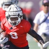 Photo: UNLV running back JaiDen Thomas (9) carries the ba