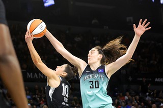 New York Liberty forward Breanna Stewart (30) blocks a layup by Las Vegas Aces guard Kelsey Plum (10) during the second half of an WNBA basketball game at Michelob Ultra Arena in Mandalay Bay Saturday, Aug. 17, 2024.