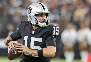 Las Vegas Raiders quarterback Gardner Minshew (15) looks to pass against the Dallas Cowboys during the first half of an NFL preseason football game, Saturday, Aug. 17, 2024, in Las Vegas. (AP Photo/Steve Marcus)