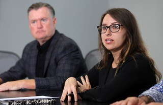 Tanya Dudinskaya, a UNLV graduate student in the Department of Criminal Justice, talks about a “mindfulness-based resilience training” program during an interview at UNLV Tuesday, Aug. 20, 2024. Robert Ulmer, dean of the UNLV Greenspun College of Urban Affairs, listens at left.