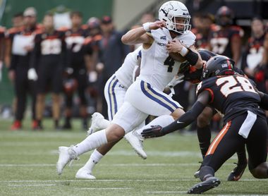 Montana State quarterback Tommy Mellott runs with the ball against Oregon State during the second half of an NCAA college football game in Portland, Ore., Saturday, Sept. 17, 2022.