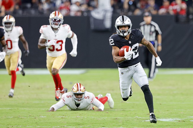 Las Vegas Raiders wide receiver Tyreik McAllister (32) heads to the end zone on a punt return during the first half of an NFL football game against the San Francisco 49ers at Allegiant Stadium Friday, Aug. 23, 2024.