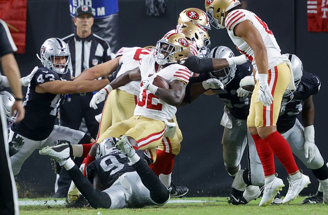 San Francisco 49ers running back Patrick Taylor Jr. (32) scores a touchdown during the first half of an NFL football game against the Las Vegas Raiders at Allegiant Stadium Friday, Aug. 23, 2024.