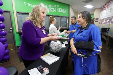 Deanna Richardson, left, security office manager, hands out Narcan nasal spray and overdose information to Maria Hernandez, casino porter, at the Westgate Friday, Aug. 30, 2024. Melody Zita, center, assistant director of Team Member Services, talks with another employee. 