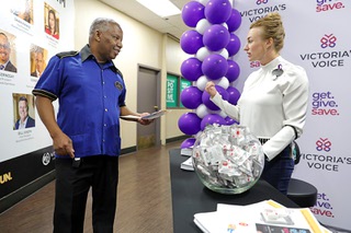 Said Humed, left, casino bellman, talks with Melody Zita, assistant director of Team Member Services, after picking up Narcan nasal spray and overdose information at the Westgate Friday, Aug. 30, 2024. Victoria’s Voice Foundation, founded to to advance initiatives and programs to prevent substance abuse, provided 2000 doses of Narcan. The event on Friday coincided with International Overdose Awareness Day which was Saturday.