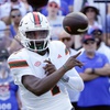 Miami quarterback Cam Ward throws a pass during the first half of an NCAA college football game against Florida, Saturday, Aug. 31, 2024, in Gainesville, Fla.