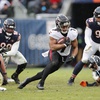 Atlanta Falcons running back Bijan Robinson (7) runs with the ball against the Chicago Bears during the second half of an NFL football game, Sunday, Dec. 31, 2023, in Chicago.