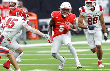 UNLV Rebels running back Greg Burrell (5) carries the ball against the Utah Tech Trailblazers during the second half of an NCAA college football game at Allegiant Stadium Saturday, Sept. 7, 2024.