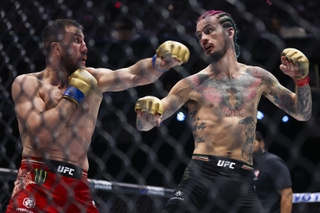 Merab Dvalishvili, left, fights Sean O’Malley in a bantamweight mixed martial arts title bout during UFC 306 at the Sphere, Saturday, Sep. 14, 2024, in Las Vegas.