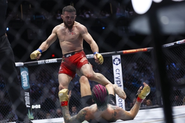 Merab Dvalishvili, left, fights Sean O’Malley in a bantamweight mixed martial arts title bout during UFC 306 at the Sphere, Saturday, Sep. 14, 2024, in Las Vegas.