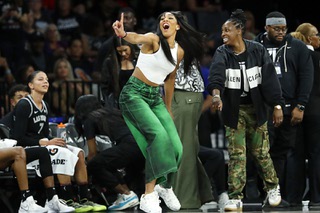 Las Vegas Aces center A'ja Wilson, left, and Las Vegas Aces guard Chelsea Gray watch from the bench during the second half of an WNBA basketball game against the Dallas Wings at Michelob Ultra Arena in Mandalay Bay Thursday, Sept. 19, 2024.