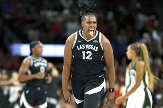 Las Vegas Aces guard Chelsea Gray (12) celebrates after making a basket against the Seattle Storm during the second half of Game One of the 2024 WNBA Playoffs first round at Michelob Ultra Arena in Mandalay Bay Sunday, Sept. 22, 2024.