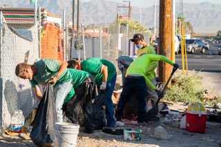 Junkman workers clean up the areas just off Charleston Blvd on S.Mojave Rd and Maple Ave in Las Vegas, Nevada on Monday, September 23, 2024.