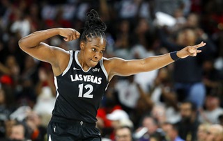 Las Vegas Aces guard Chelsea Gray (12) celebrates after making a basket against the Seattle Storm during the first half of Game Two of the 2024 WNBA Playoffs first round at Michelob Ultra Arena in Mandalay Bay Tuesday, Sept. 24, 2024.