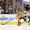 Vegas Golden Knights right wing Tanner Pearson (70)  and Los Angeles Kings defenseman Drew Doughty (8) skate after the puck during the first period of an NHL preseason game at T-Mobile Arena Wednesday, Sept. 25, 2024, in Las Vegas. (