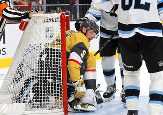 Vegas Golden Knights center Jack Eichel (9) crawls out from the net during the third period of an NHL preseason game against the Utah Hockey Club at T-Mobile Arena Friday, Sept. 27, 2024. Jack Eichel fell over Utah Hockey Club goaltender Jaxson Stauber and went into the goal while trying to score.