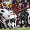 Washington Commanders wide receiver Noah Brown (85) catches a 52-yard touchdown pass in the end zone as time expires to give the Commanders an 18-15 win over the Chicago Bears in an NFL football game Sunday, Oct. 27, 2024, in Landover, Md.